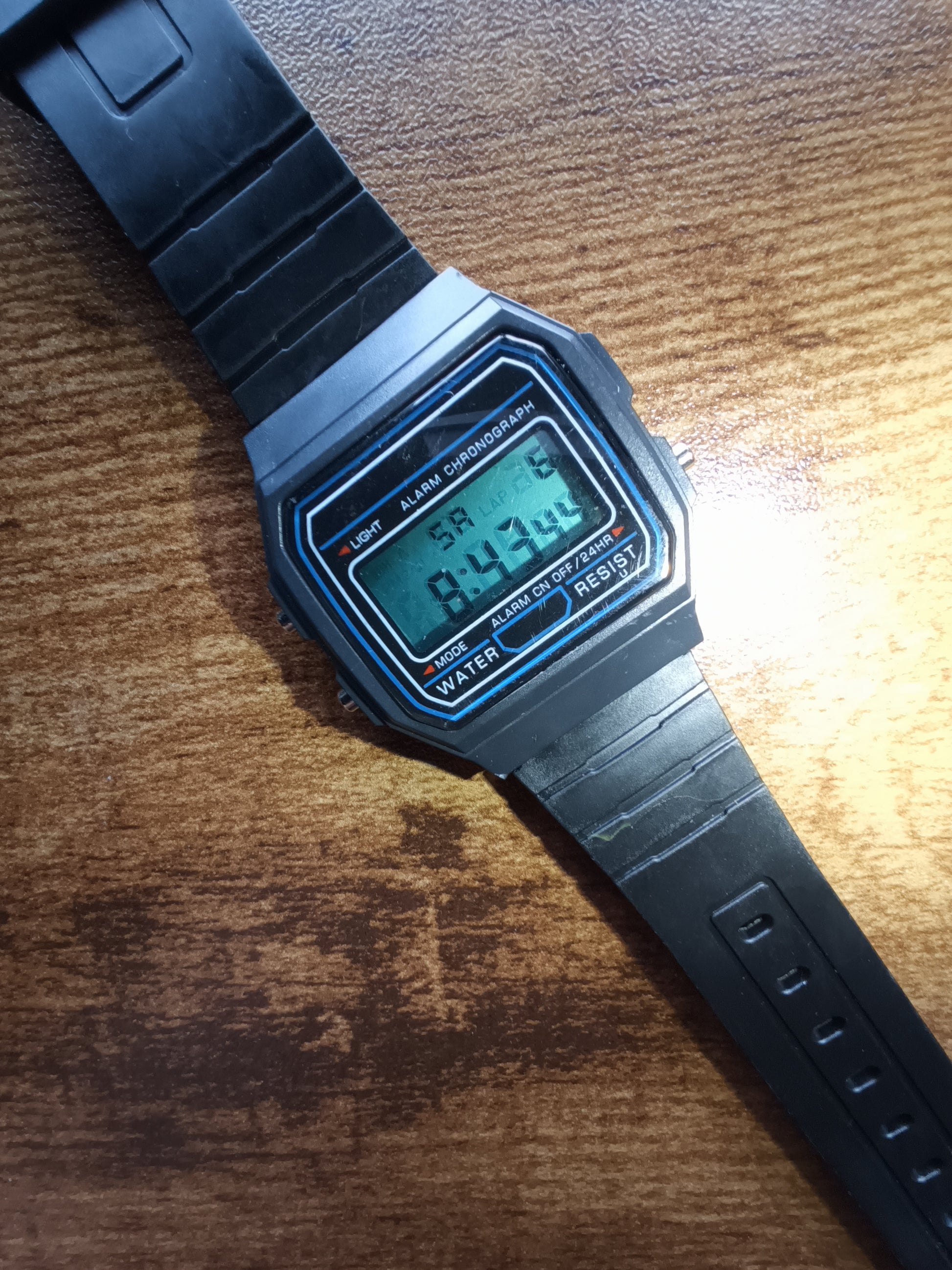 Casio style watch with teal screen mod