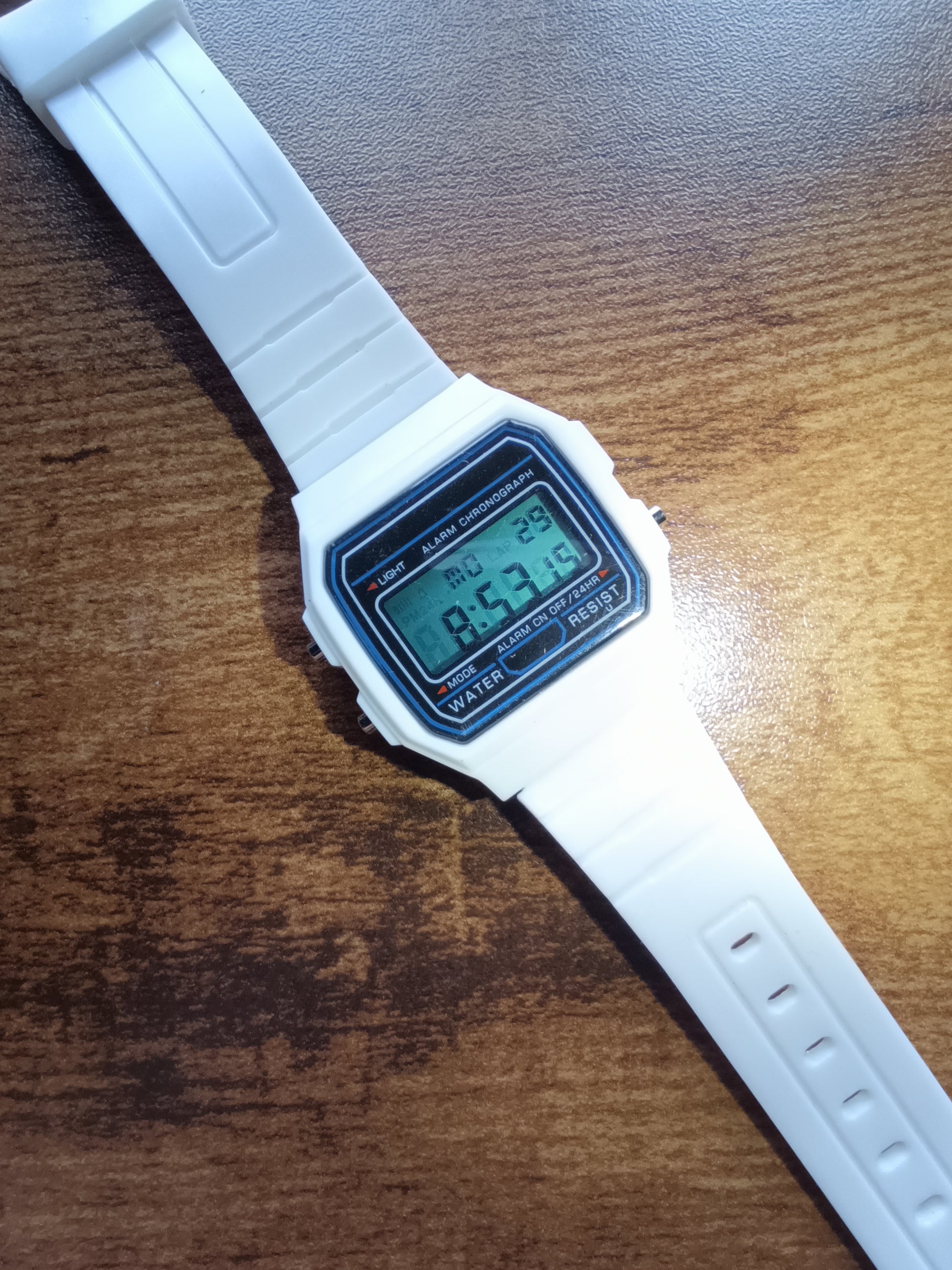 Casio style watch with teal screen mod