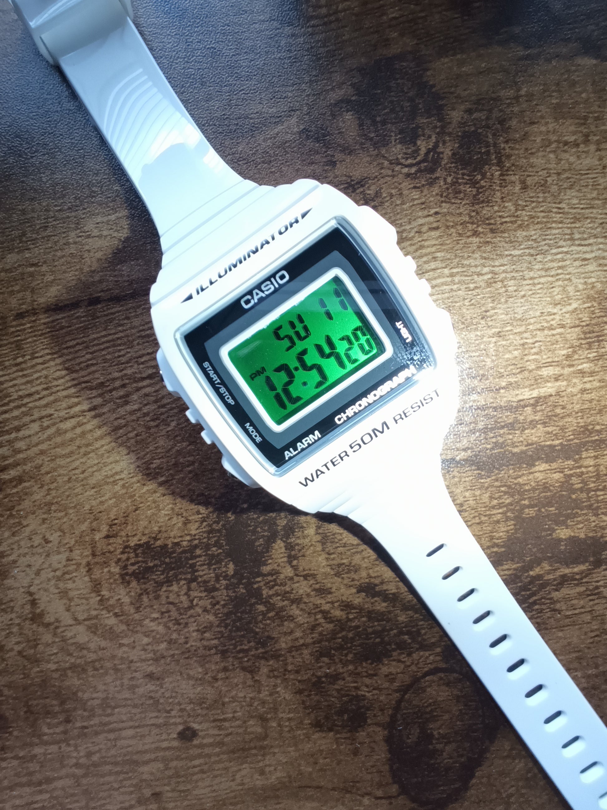 Casio W-215H with green screen mod